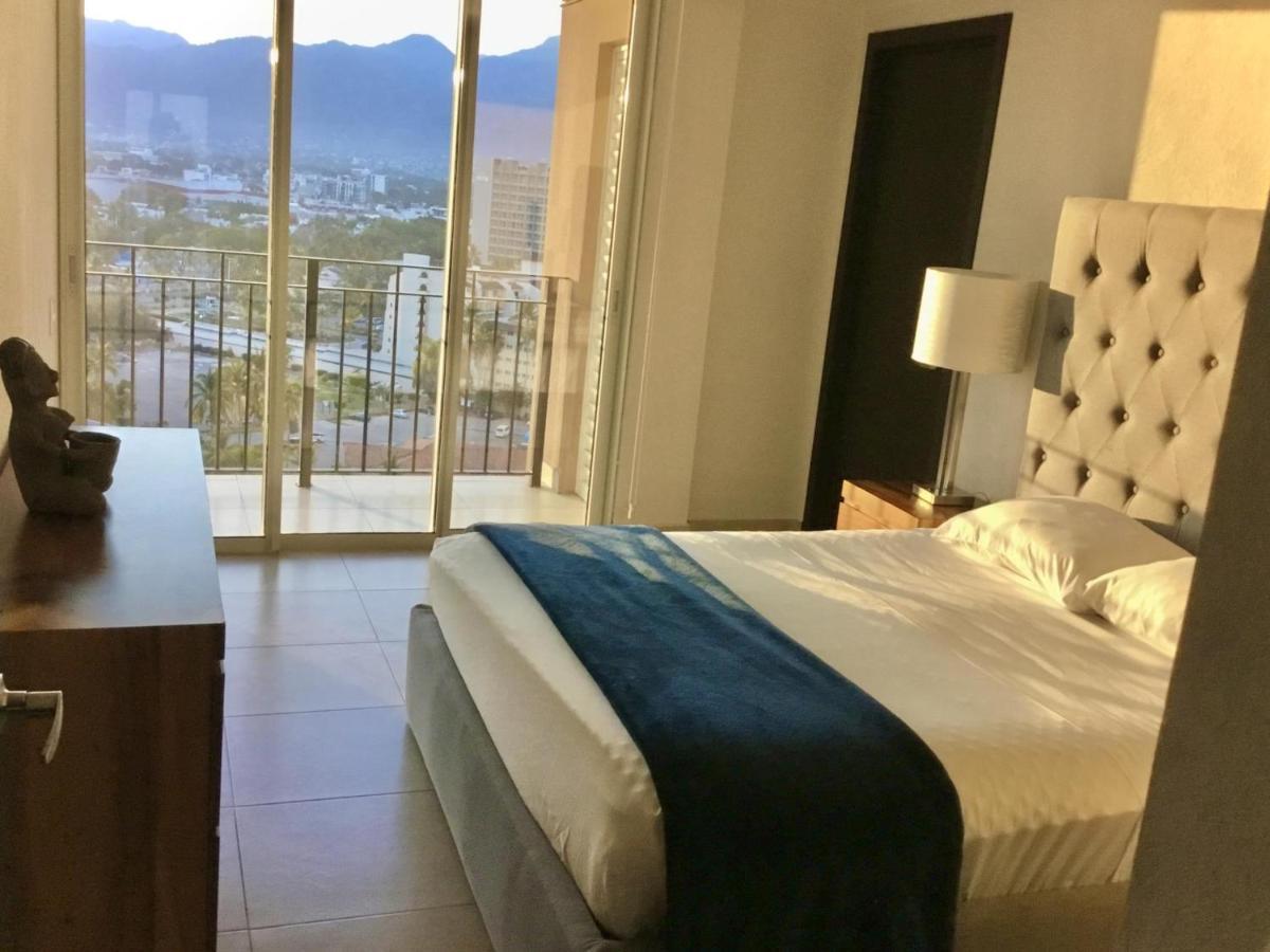 Apartamentos Grand Venetian ปูแอร์โตบาญาร์ตา ภายนอก รูปภาพ